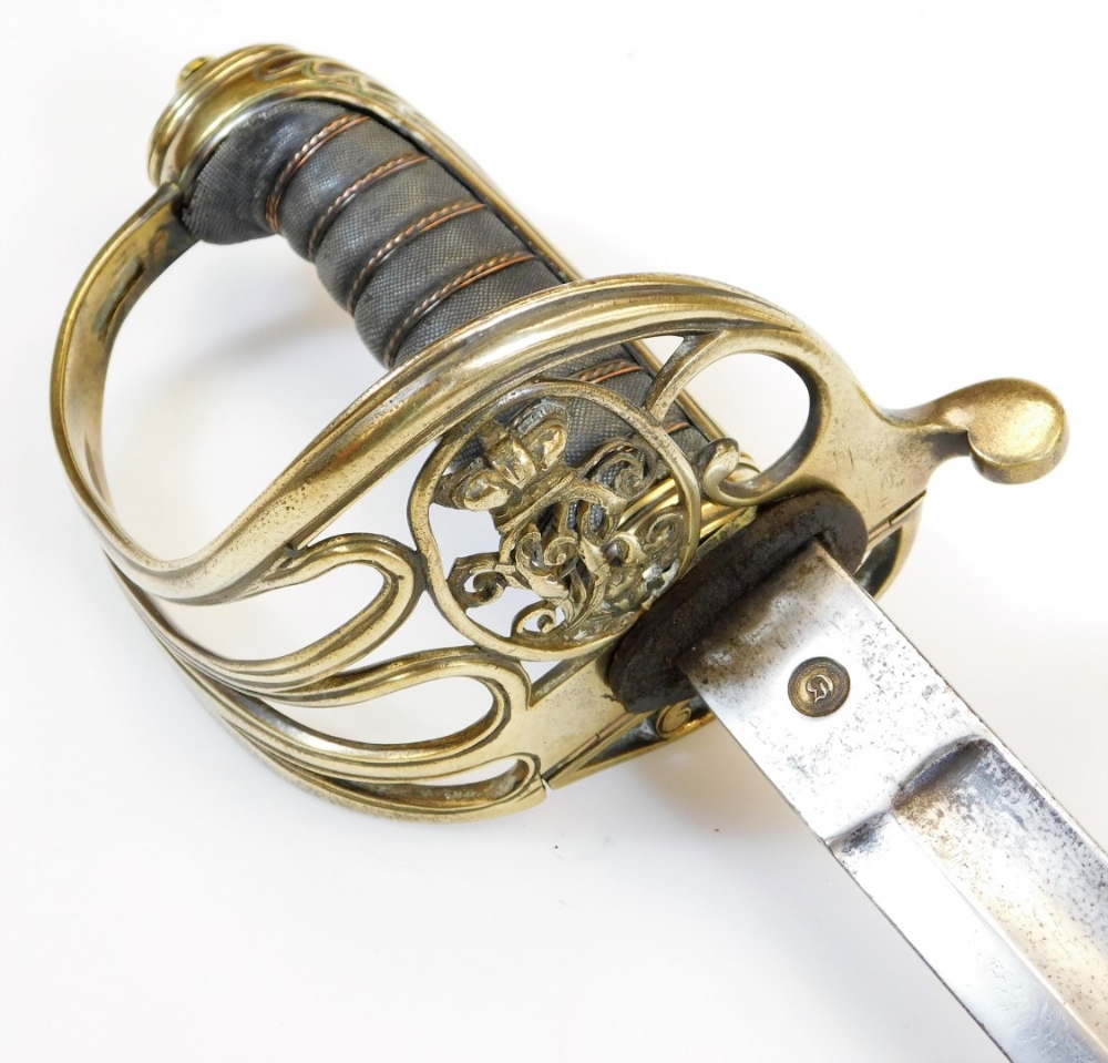 A cavalry sword, with plain silver coloured scabbard, shaped blade, pierced basket weave hilt - Image 2 of 5