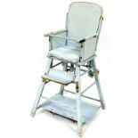 A 20thC vintage child's high chair, with over stuffed back arms and cushion seat, painted blue,