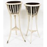 A graduated pair of Regency style planters, each with domed inserts and slatted upper sections on