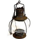 An early 20thC cast metal and glass hanging lantern, with bulbous shade and a wirework and chain