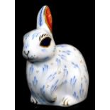 A Royal Crown Derby paperweight snowy rabbit ornament, gilt stopper, 9cm high. (boxed)