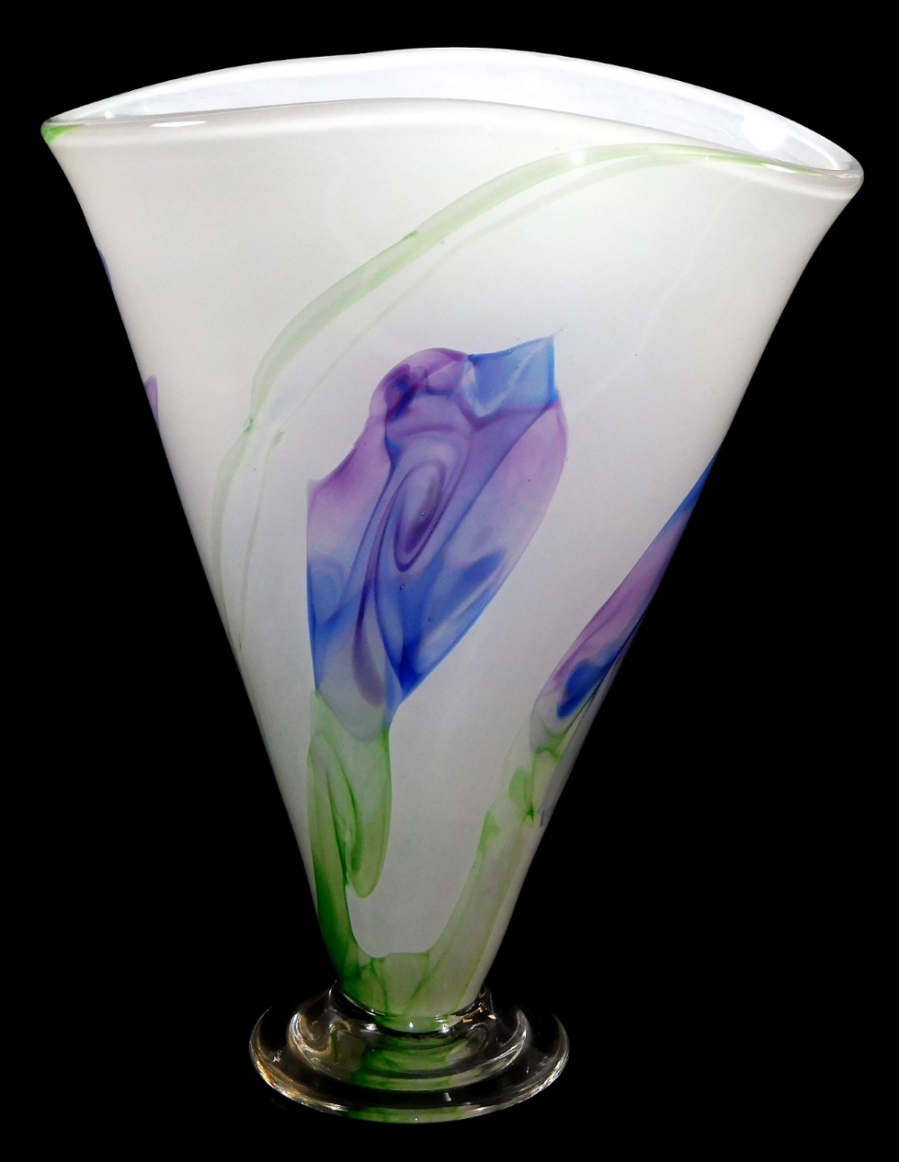 A 20thC studio glass vase, of shaped form, predominantly in purple and green, on a green ground,