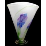 A 20thC studio glass vase, of shaped form, predominantly in purple and green, on a green ground,