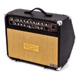 A Sherwood XTR acoustic guitar amplifier, with effects, in purple with mesh speaker front, with