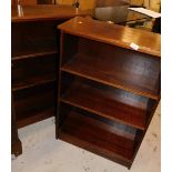 A pair of mahogany finish open bookcases.