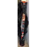 A Rossignol Pure Mountain Company set of skis, in outer canvas bag in red trim.