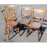A pair of 19thC ash and elm chairs, with shaped back splats, turned legs and H stretchers, and two