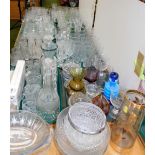 Various drinking glasses, suites, etc., brandy balloons, some with green stems, decanters, blue