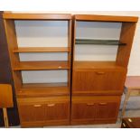 A G Plan style teak open bookcase, with double cupboard beneath with cup handles, and a similar open