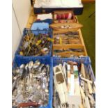 Various flatware, cutlery, tableware, knife boxes, brass ware tongs, padlock, flags, linen, etc. (