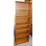 A teak narrow open bookcase.