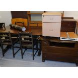 An oak compactum side cabinet, an oak rectangular dining table with matched ladderback chairs, two