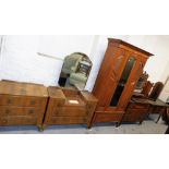 An Edwardian walnut bedroom suite, comprising single door wardrobe, mirror back dressing chest of