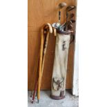 Various vintage golf clubs, metal headed, etc., MU, hand forge, walking sticks, some set with badges