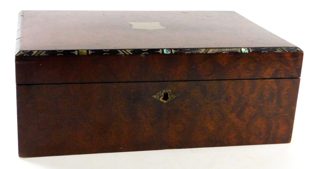 A 19thC jewellery casket, of rectangular form, with an outer decorative border and metal vacant shie