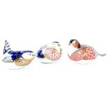 Three Royal Crown Derby porcelain paperweights, each modelled in the form of a bird, a pheasant, a w