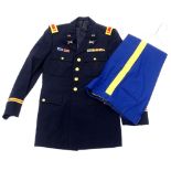 A Vietnam War period US officer's uniform, with medal bar, to include blue trousers with gold piping