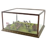 A modern diorama, depicting peninsula war type soldiers fighting, in a glazed wooden case, 32cm wide