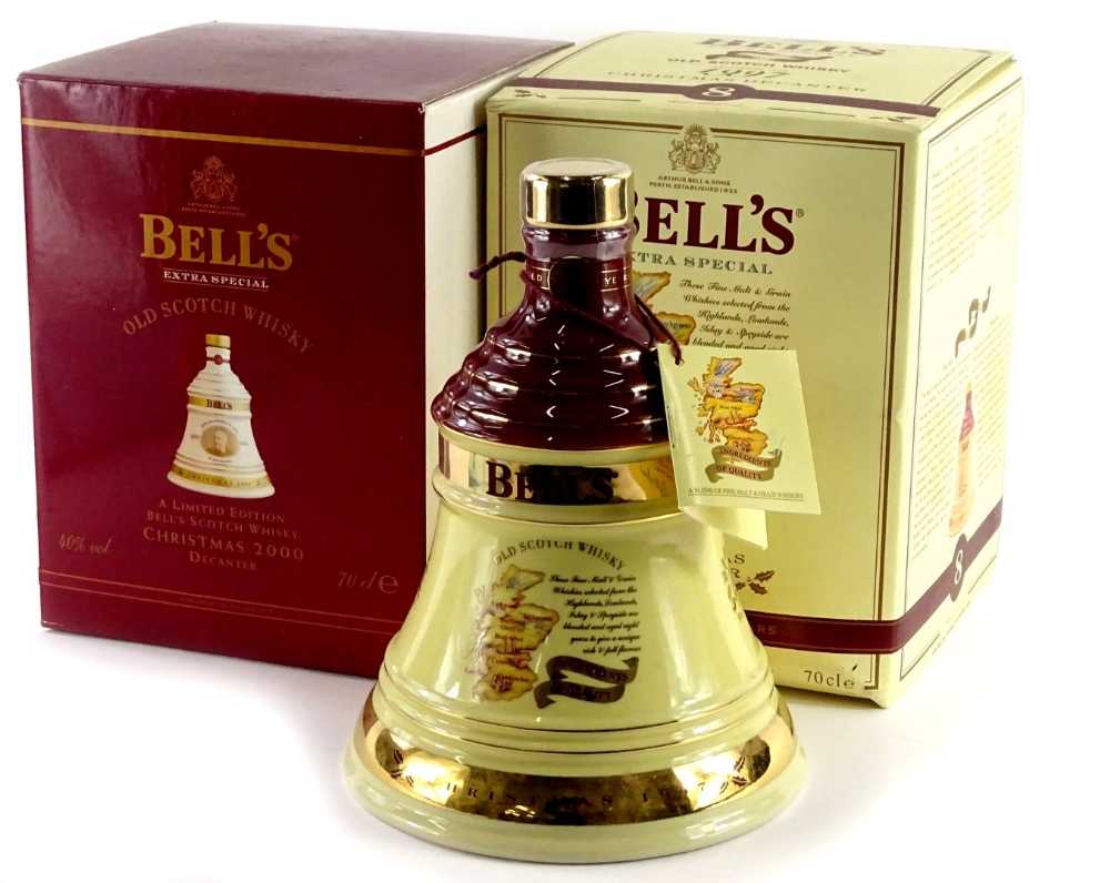 Two bottles of Bells extra special Christmas whisky for 1997 and 2000.