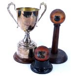 A collection of sporting memorabilia, to include a cricket ball mounted on a pedestal, with plaque