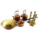 Various metalware, to include three Victorian copper kettles, and two pairs of brass candlesticks.