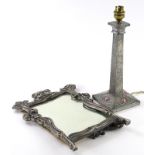 A late 19thC Art Nouveau style silver plated copper dressing mirror, with a bevelled plate and a str