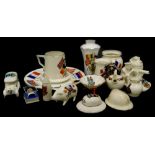 A collection of crested china, a First World War machine gunner with crest of Ashover, a crested Fir