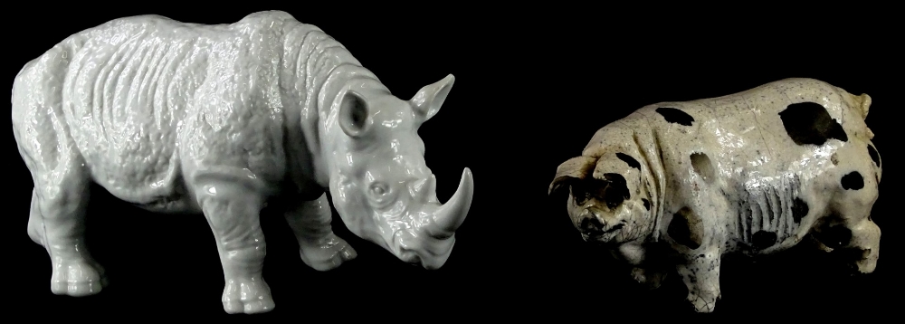 A porcelain model of a rhinoceros, 33cm long, and a studio ceramic pig, in distinct initials, BM, to