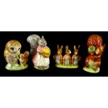 Four Beswick Beatrix Potter figures, Old Mr Brown, Squirrel Nutkin, Goody Tiptoes and Flopsy Mopsy a