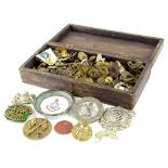 A collection of military cap badges, a small pin tray with Aynsley ceramic insert, an Egyptian souve