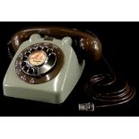An unusual 1960's type 706 grey vintage telephone, with chrome dial, bell on/off switch.