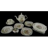 A collection of Royal Albert World of Beatrix Potter plates, a teapot, etc.