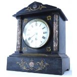 A late 19thC French black slate and marble mantel clock, the enamel dial bearing the name J W Benson