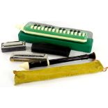 A quantity of musical instruments, to include a Hohner Melodica Soprano, a Rytmus Marina harmonica,