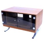 A 1970's/80's Danish style teak television stand, with two smoked glass doors, each with brushed fin