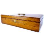 An oak gun case, with adapted baize lined interior, 38cm x 20cm.