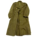 An Army green great coat, branded number 113E to interior, dated 1950 to the indistinct label.