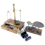 A set of brass chemist scales, the mahogany base with label for De Grave, Short and Co Limited, anot