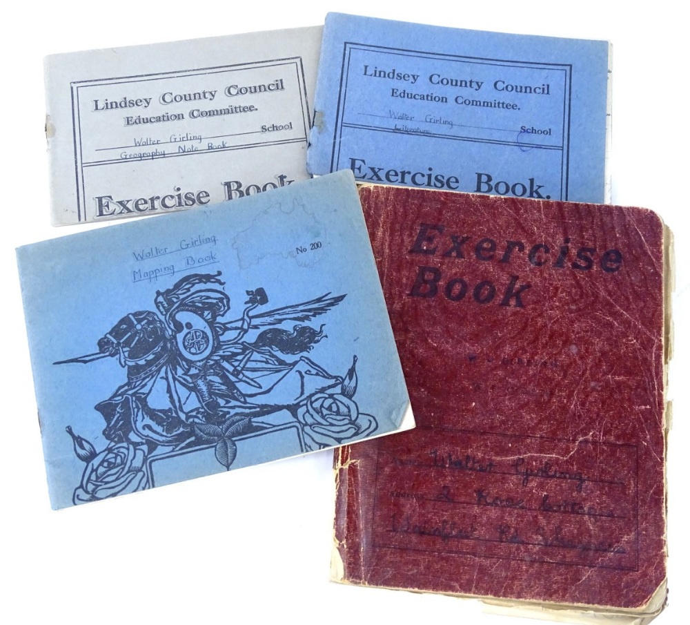 A three child's exercise books belonging to a Walter Girling, the largest containing various sketche