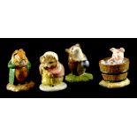 A collection of four John Beswick Beatrix Potter figures, The Head Gardener, Yok Yok in the Tub, Mrs