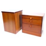 A Stag teak bedside cabinet, with three drawers, shaped handles, on a plinth base, 55cm high, 56cm d