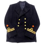 A World War Two named naval jacket, with gold piping, etc.