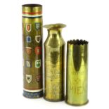 Three decorated brass Trench Art vases, to include one painted with various regimental crests, anoth