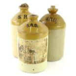 Three stoneware flagons, each bearing initials SRD for Services Rum Department, various sizes.