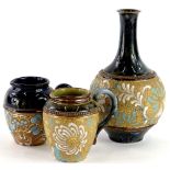 Three items of Doulton Slaters patent, a bottle shaped vase with mottled green band to top and botto