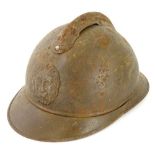 A First World War period Belgium Adrian helmet, traces of original paint, with simple strap, indisti