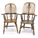 A near pair of 19thC yew, ash and elm Windsor chairs, each with a high back, a burr yew pierced spla