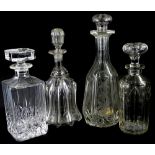 A collection of four 19thC and later decanters and stoppers, (AF).