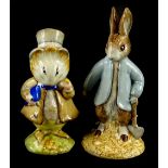 A John Beswick Beatrix Potter figure, Peter Rabbit Digging and another figure Amiable Guinea Pig.