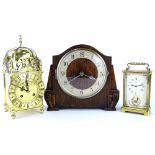 Three clocks, to include a presentation lantern type clock, an Art Deco mantel clock and a Schatz ca